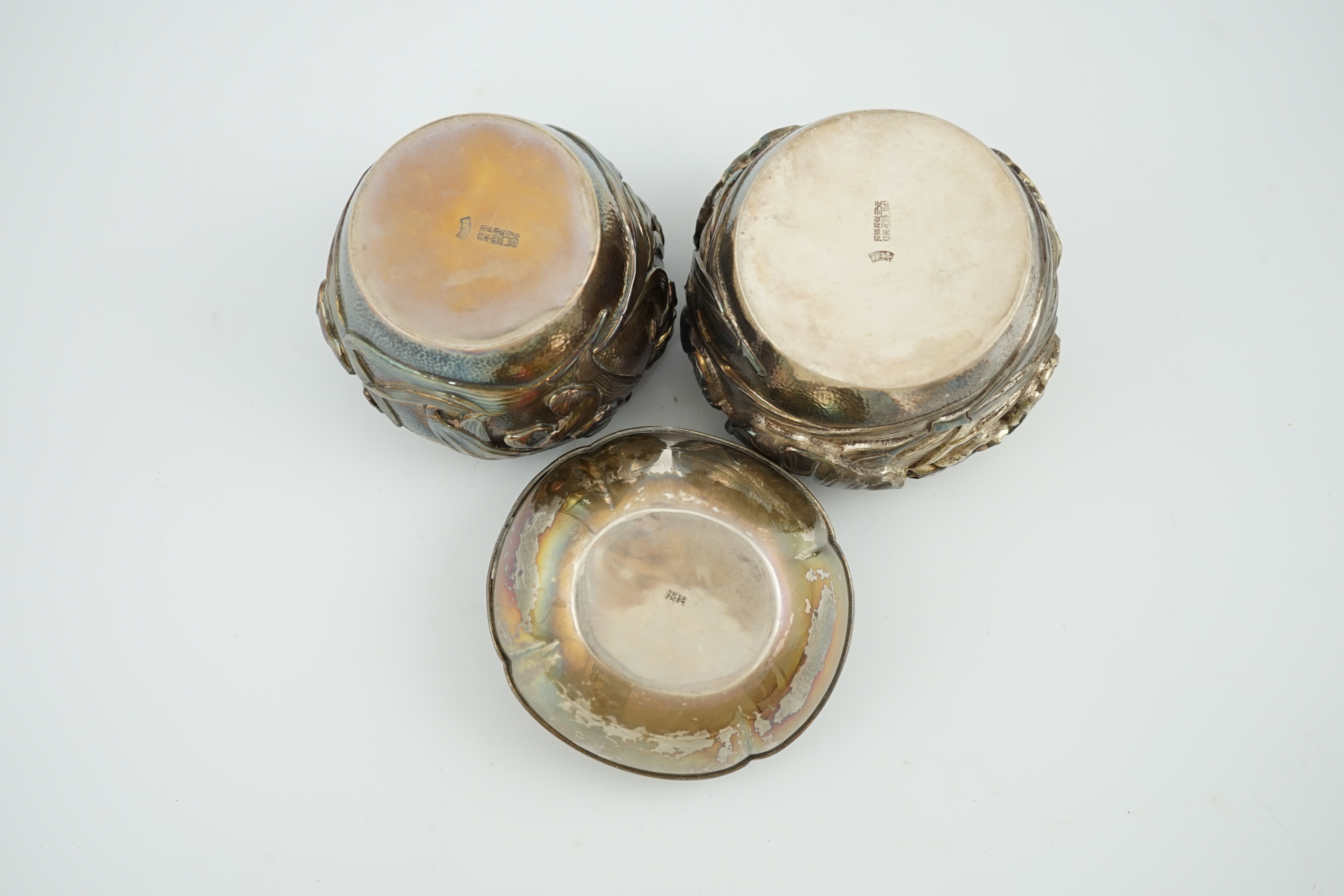 Three assorted early 20th century Japanese silver boxes with covers